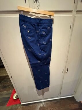 Orvis Blue pants with gray embroided donkeys.